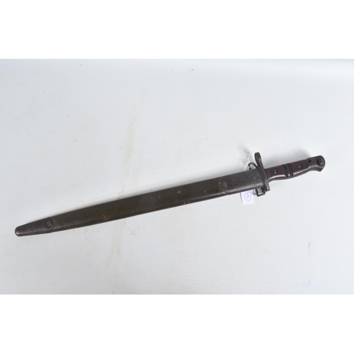 277 - A 1917 DATED REMINGTON UNITED STATES ARMY RIFLE BAYONET, the grip and blade are in good condition an... 