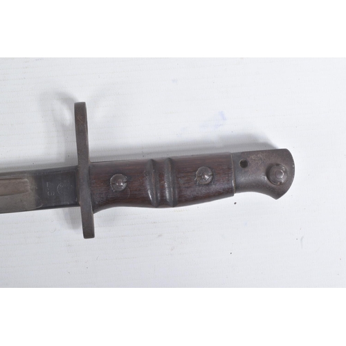 277 - A 1917 DATED REMINGTON UNITED STATES ARMY RIFLE BAYONET, the grip and blade are in good condition an... 