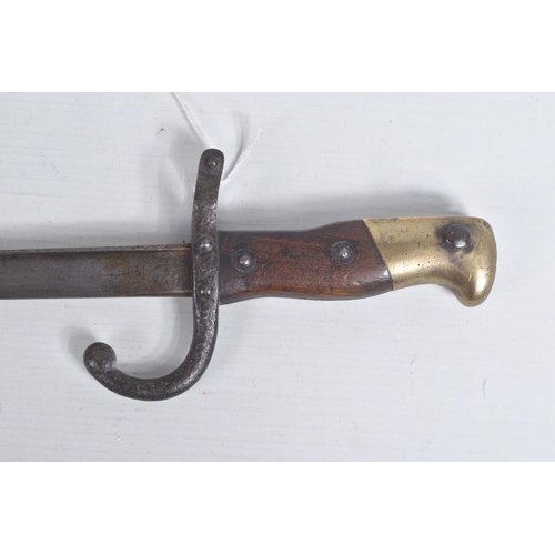 279 - A FRENCH 1977 DATED GRAS BAYONET AND SCABBARD, this is in good condition and the top of the blade is... 