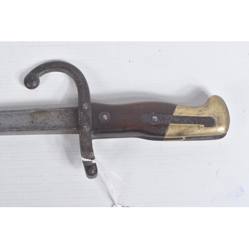 279 - A FRENCH 1977 DATED GRAS BAYONET AND SCABBARD, this is in good condition and the top of the blade is... 