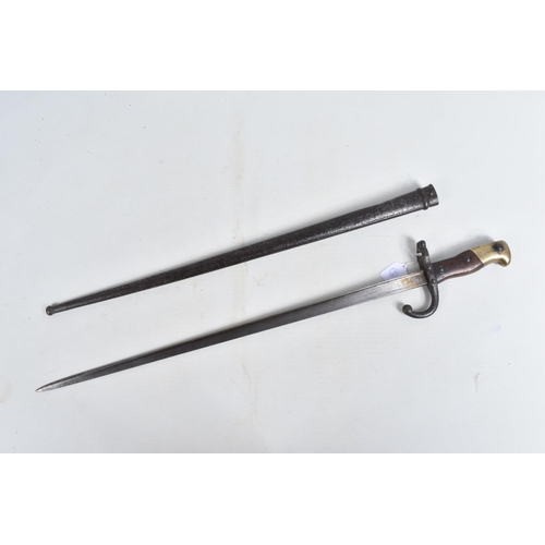 279 - A FRENCH 1977 DATED GRAS BAYONET AND SCABBARD, this is in good condition and the top of the blade is... 