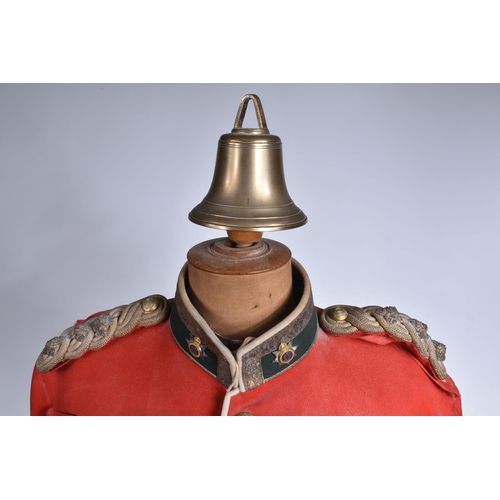 289 - A DEVONSHIRE REGIMENT RED MILITARY TUNIC, this has Devonshire buttons and collar badges and the insi... 