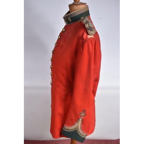 289 - A DEVONSHIRE REGIMENT RED MILITARY TUNIC, this has Devonshire buttons and collar badges and the insi... 