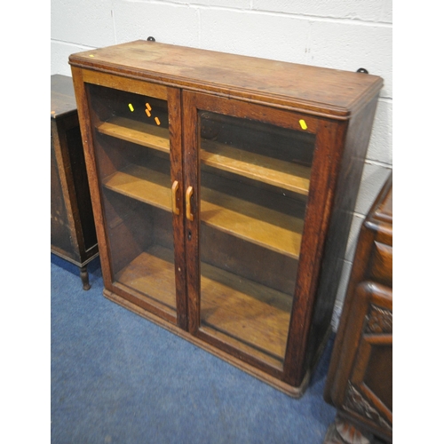 160 - A 1940'S OAK SIDEBOARD, along with an oak glazed two door bookcase and a record cabinet, condition r... 