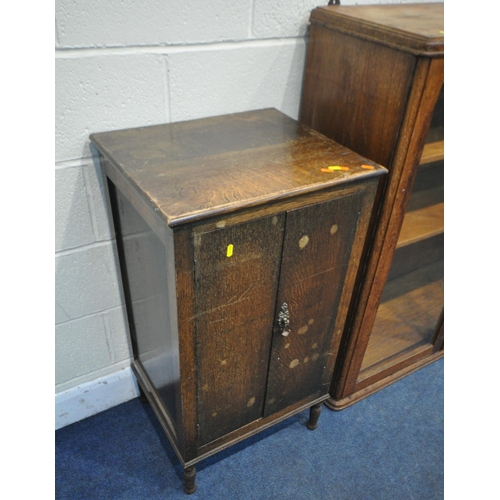 160 - A 1940'S OAK SIDEBOARD, along with an oak glazed two door bookcase and a record cabinet, condition r... 