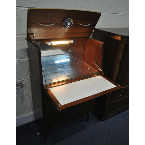 161 - A 1940'S OAK BEDROOM SUITE, comprising a dressing table and tall boy, along with a mid-century cockt... 