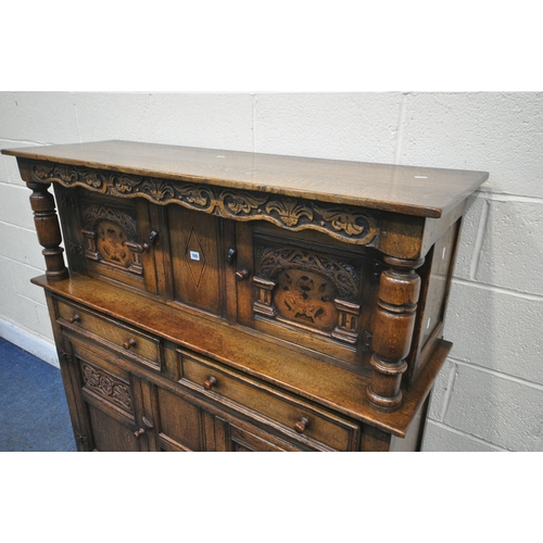 165 - A REPRODUCTION OAK AND MARQUETRY INLAID COURT CUPBOARD, with an arrangement of cupboards and two dra... 