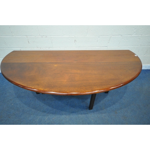 166 - A REPRODUCTION MAHOGANY GATE LEG WAKE TABLE, that opens to an oval, on eight reeded legs, length 198... 