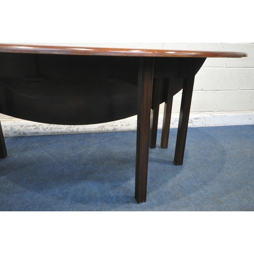 166 - A REPRODUCTION MAHOGANY GATE LEG WAKE TABLE, that opens to an oval, on eight reeded legs, length 198... 