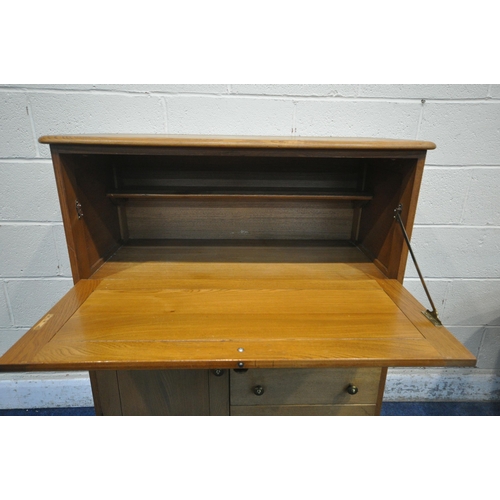 170 - A MID-CENTURY ERCOL STYLE BLONDE ELM BUREAU, with four drawers besides a single cupboard door, width... 