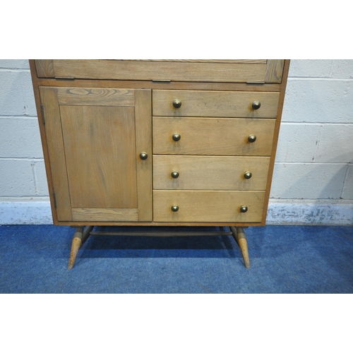 170 - A MID-CENTURY ERCOL STYLE BLONDE ELM BUREAU, with four drawers besides a single cupboard door, width... 