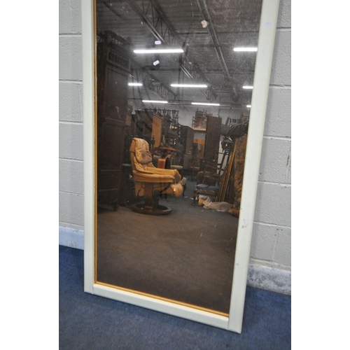 173 - A LARGE PAINTED PINE RECTANGULAR WALL MIRROR, with a pink tinted glass, 235cm x 83cm, condition repo... 