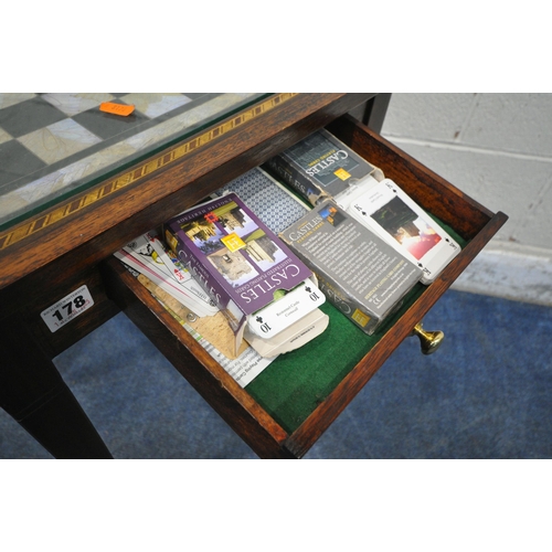 178 - AN EDWARDIAN SQUARE MAHOGANY GAMES TABLE, with a chess table top, and two drawers, containing a quan... 