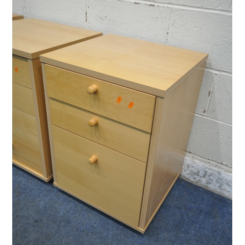 179 - A SET OF THREE MODERN BEECH FILING CABINETS, one with four drawers, two with three drawers (3)