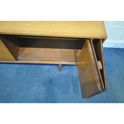 217 - POSSIBLY WHITE AND NEWTON, A MID CENTURY TEAK SIDEBOARD, with three graduated drawers, a fall front ... 