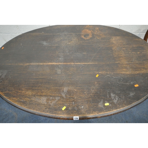 226 - A 20TH CENTURY OAK OVAL TABLE, raised on square tapered legs, with castors, length 153cm x depth 107... 