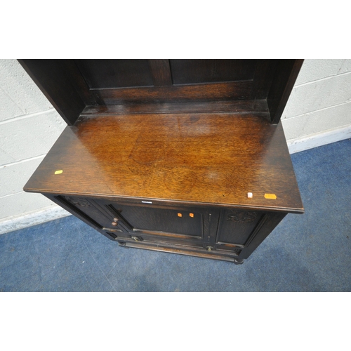 227 - A 20TH CENTURY OAK DRESSER, the two tier plate rack with quatrefoil detail, atop a base with a singl... 