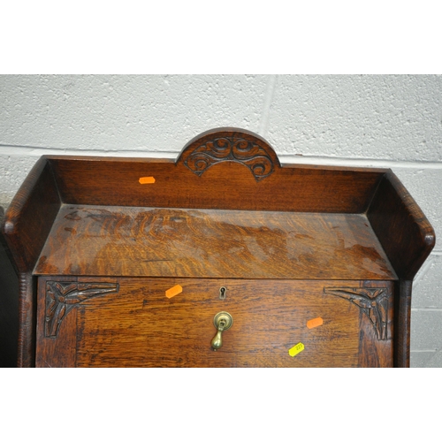 229 - TWO 20TH CENTURY OAK BUREAUS, the larger bureau with a fall front door, above a single drawer, width... 