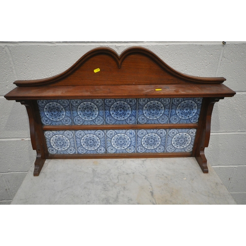 230 - A 20TH CENTURY MARBLE TOP WASH STAND, with a raised tile back, a single drawer, above a cupboard doo... 