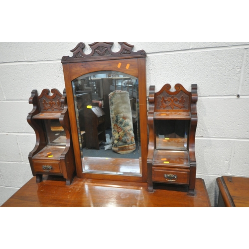 238 - A 20TH CENTURY MAHOGANY DRESSING CHEST, with a central bevelled edge swing mirror, flanked by two sm... 