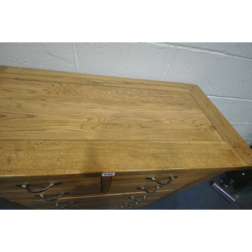 245 - A MODERN LIGHT OAK CHEST OF FOUR SHORT OVER THREE LONG DRAWERS, width 97cm x depth 45cm x height 114... 