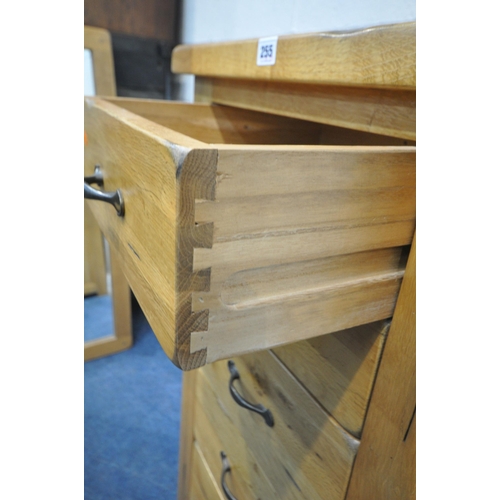 255 - A MODERN LIGHT OAK TALL CHEST OF SIX GRADUATED DRAWERS, width 55cm x depth 43cm x height 120cm, cond... 