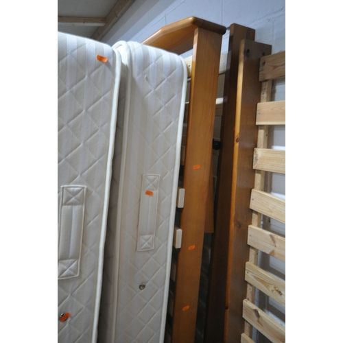 262 - A PAIR OF REYLON SINGLE MATTRESSES, with a guest bed, condition report: general signs of usage