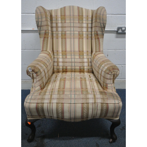 270 - A GEORGIAN MAHOGANY WING BACK ARMCHAIR, upholstered in tartan upholstery, on cabriole front legs and... 