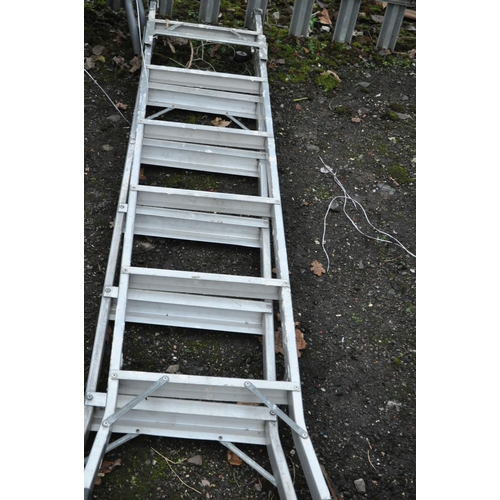 13 - A CAST IRON AND WOODEN SLATTED GARDEN BENCH, with distressed slats, width 122cm, along with two step... 