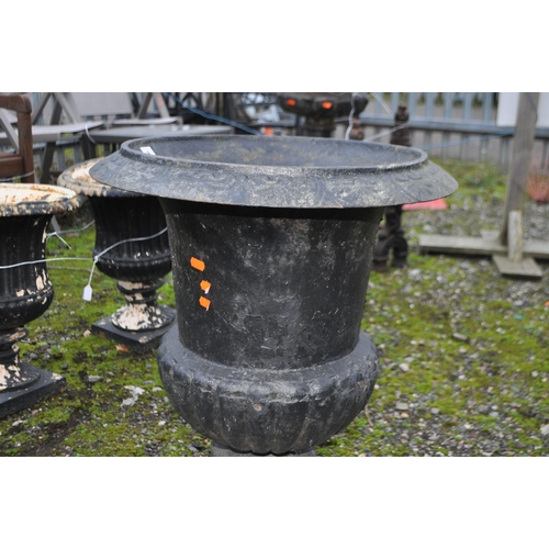 5 - AN EARLY 20th CENTURY CAST IRON GARDEN URN, with fluted bowl and detailed rim, height 70cm