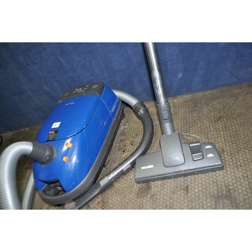 74 - A MIELE S381 VACUUM CLEANER with floor head (PAT pass and working)