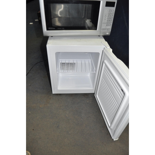 81 - AN ESSENTIAL TABLE TOP FREEZER width 44cm, depth 47cm, height 52cm and a Panasonic microwave (both P... 