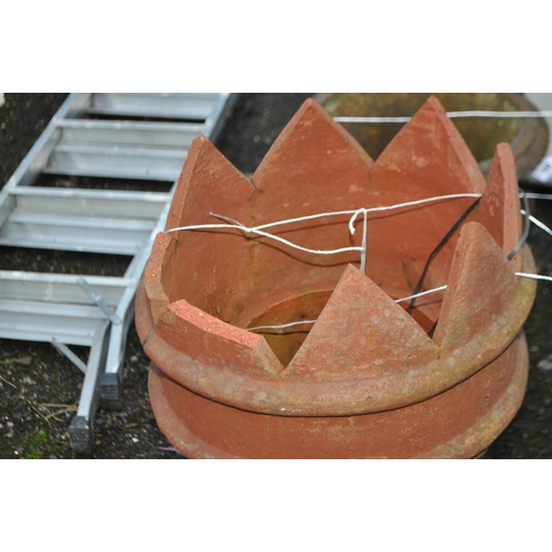 9 - A PAIR OF TERRACOTTA CHIMNEY POTS, with crown tops, height 70cm, condition report: some losses to sp... 