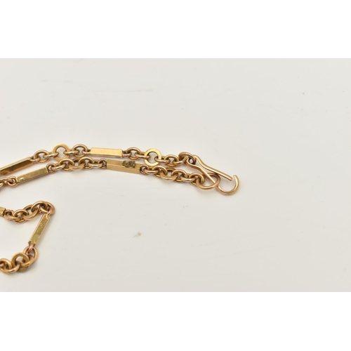 407 - A YELLOW METAL BRACELET, a fancy link bracelet fitted with a lobster clasp, approximate length 180mm... 