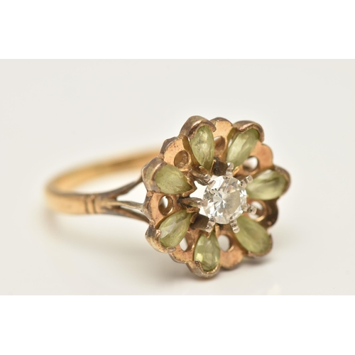 416 - A YELLOW METAL DIAMOND CLUSTER RING, a principally set round brilliant cut diamond, approximate tota... 