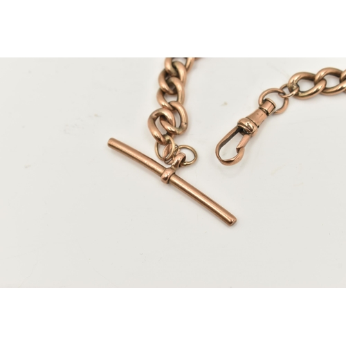 423 - A YELLOW METAL ALBERT CHAIN, a curb link chain, fitted with a T-bar and lobster clasp, approximate l... 