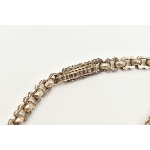 424 - A WHITE METAL ALBERT CHAIN, a fancy trombone link chain, fitted with a T-bar and spring clasp, appro... 