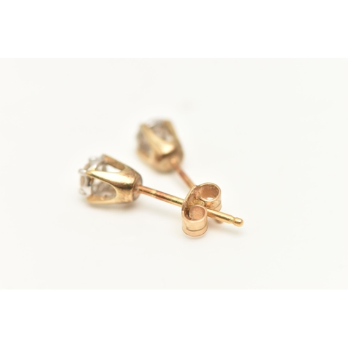 429 - A PAIR OF YELLOW METAL DIAMOND STUD EARRINGS, each set with a round brilliant cut diamond, approxima... 