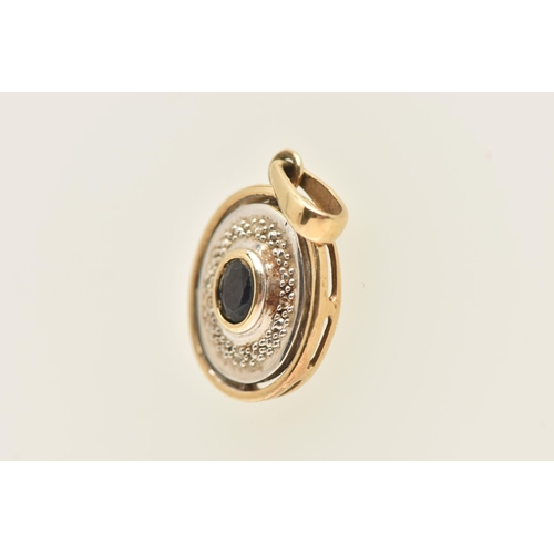 432 - A 9CT GOLD SAPPHIRE AND DIAMOND PENDANT, of an oval form, set with an oval cut deep blue sapphire ce... 