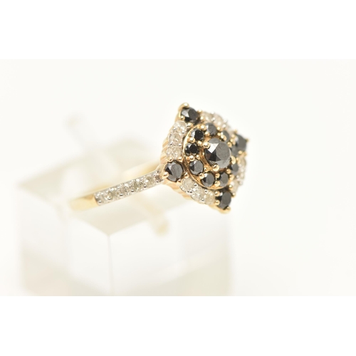 450 - A 9CT GOLD GEM SET RING, designed as a circular cluster of deep blue sapphires and single cut diamon... 