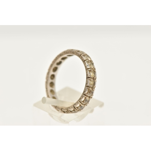 465 - AN 18CT WHITE GOLD SYNTHETIC SPINEL ETERNITY RING, est with colourless synthetic spinel, hallmarked ... 