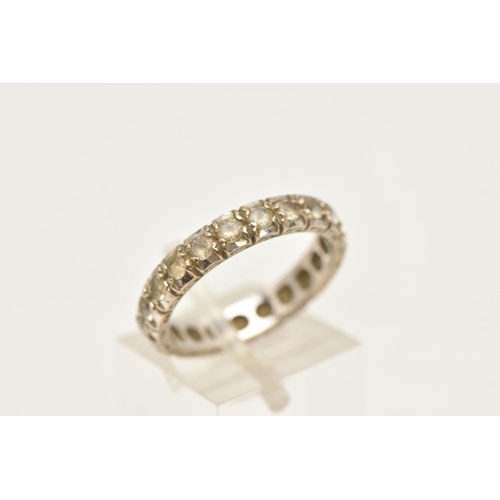 465 - AN 18CT WHITE GOLD SYNTHETIC SPINEL ETERNITY RING, est with colourless synthetic spinel, hallmarked ... 