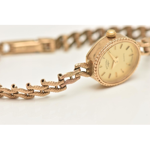 480 - A 9CT YELLOW GOLD ROTARY WRISTWATCH, the champagne coloured dial, with hourly applied markers, the d... 