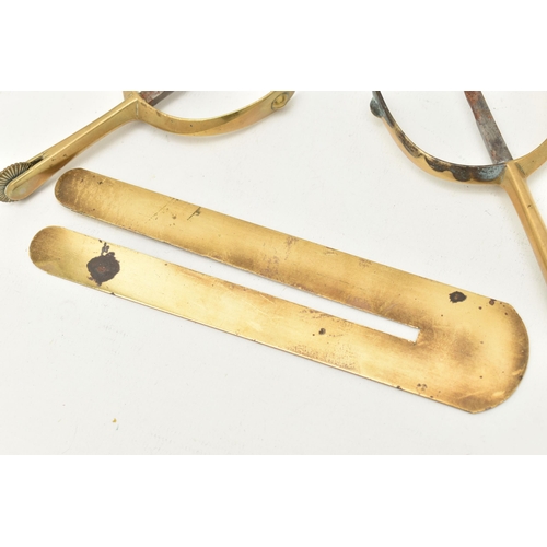 528 - A PAIR OF BRASS STIRRUPS AND A BUTTON POLISHING GUARD