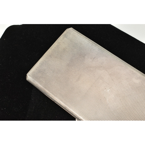 530 - A 1940s SILVER CIGARETTE CASE, the case with engine turned surface detail and initial monogram readi... 