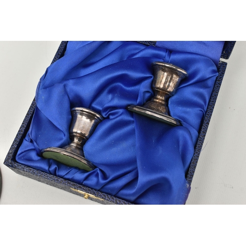 537 - A CASED PAIR OF SILVER DWARF CANDLESTICKS AND A DISH, the candle sticks on round weighted bases, eac... 