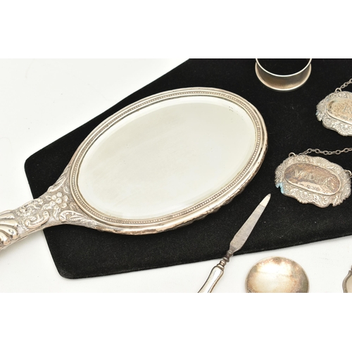 541 - ASSORTED SILVER ITEMS, to include a vanity hair brush and hand held mirror, embossed with a foliate ... 