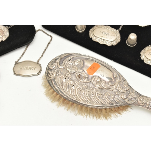 541 - ASSORTED SILVER ITEMS, to include a vanity hair brush and hand held mirror, embossed with a foliate ... 