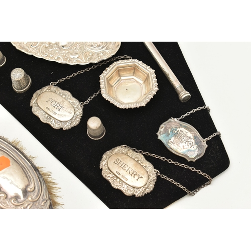 541 - ASSORTED SILVER ITEMS, to include a vanity hair brush and hand held mirror, embossed with a foliate ... 