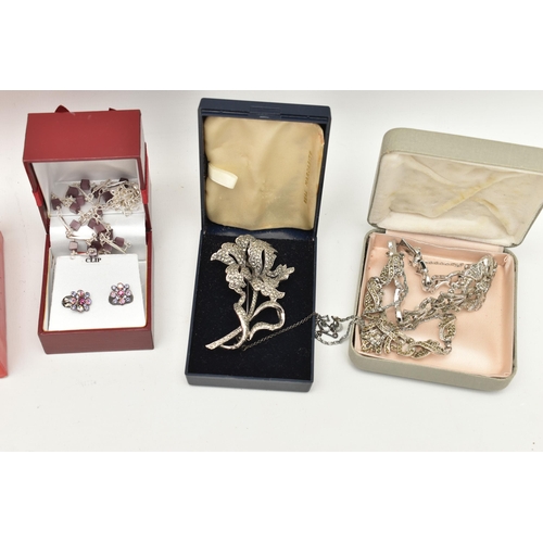 545 - A SMALL BOX OF ASSORTED ITEMS, to include a selection of cufflinks, brooches, earring etc